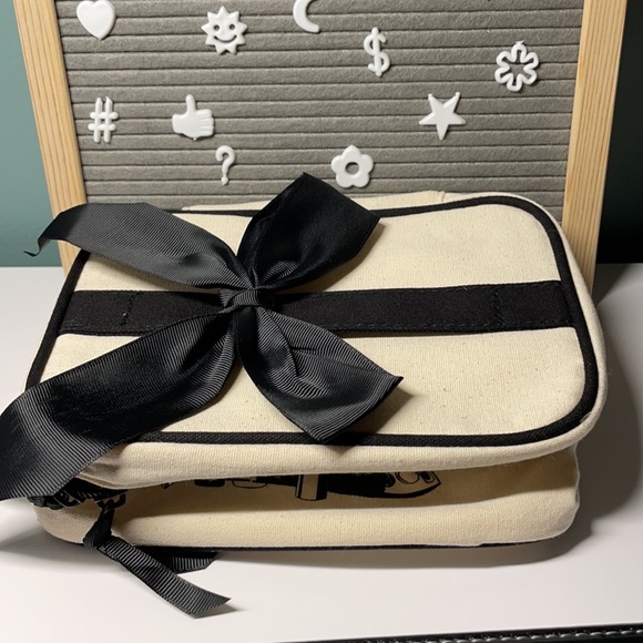 HALLMART COLLECTIBLES
Canvas Cosmetic Bag - Picture 7 of 10